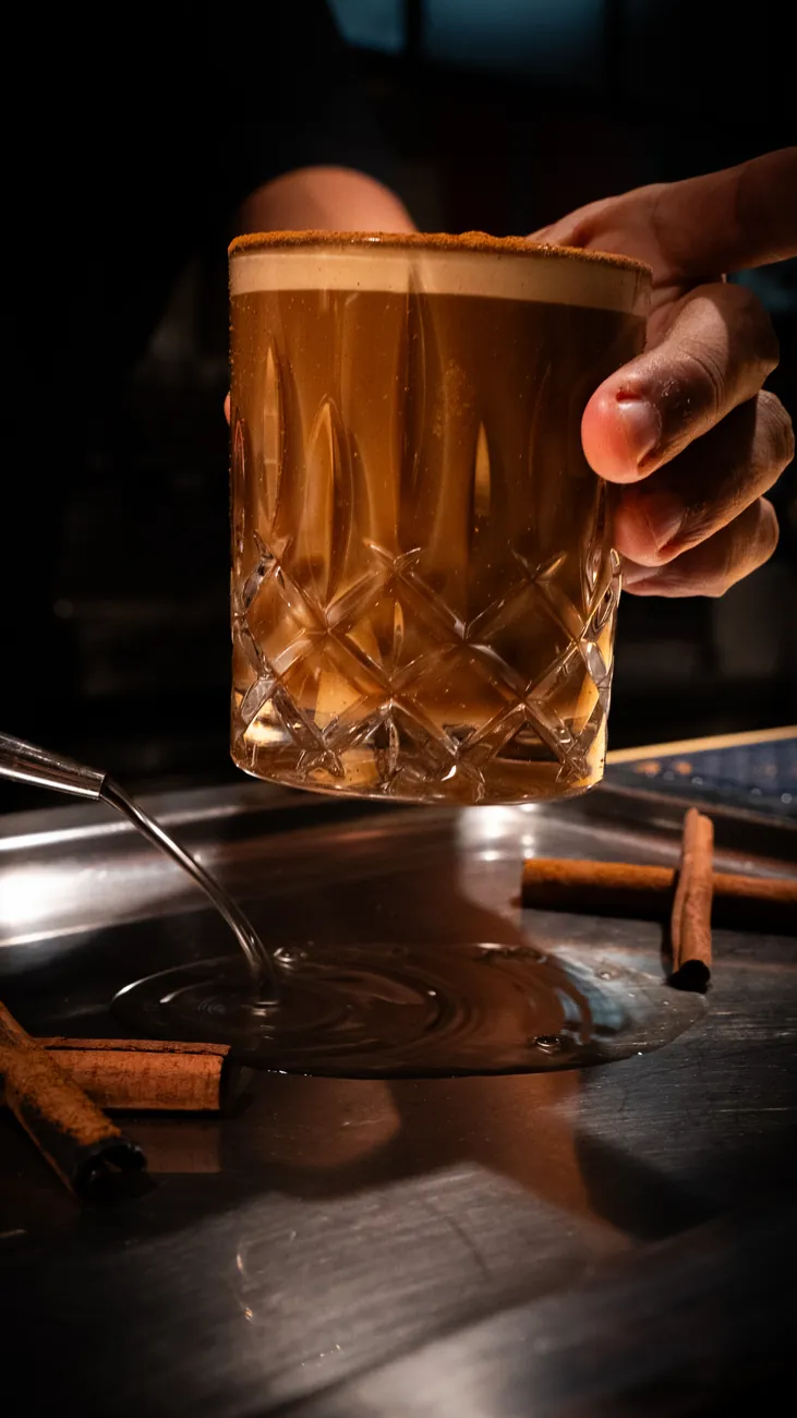 Bartender serving a coffee cocktail
