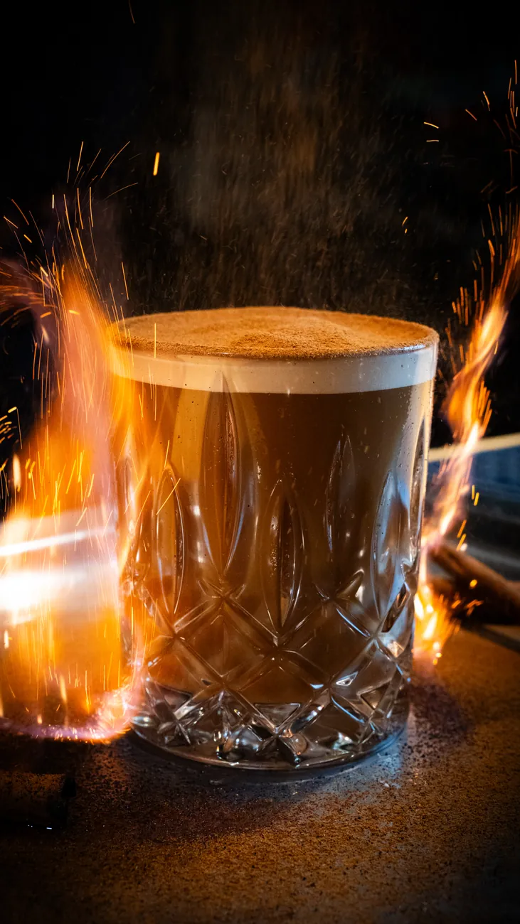 Coffee cocktail with sparks at the bar
